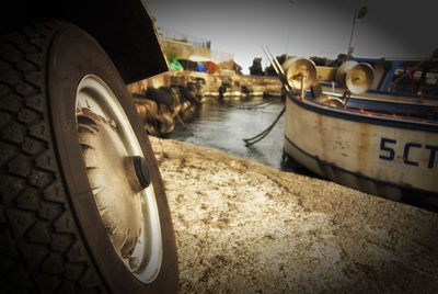 Close-up of boats moored in sea