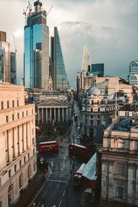 Modern buildings in city against sky