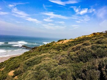 Scenic view of beach against sky