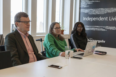 Disabled woman during meeting in office