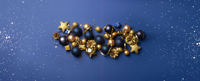 High angle view of candies against blue background