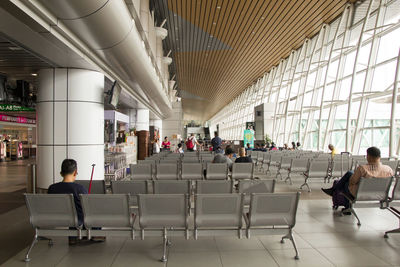 Group of people waiting at airport