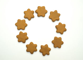 High angle view of cookies on white background