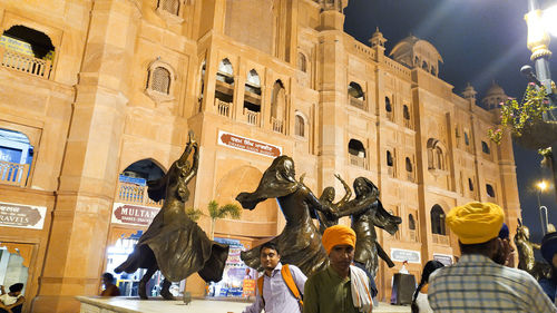 Group of people in front of building