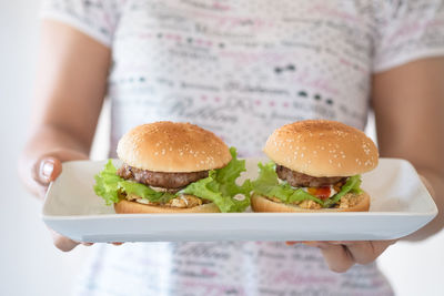 Close-up of woman holding food