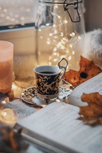 Close-up of coffee cup on table