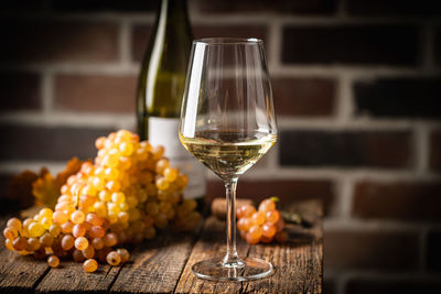 Close-up of wineglass on table