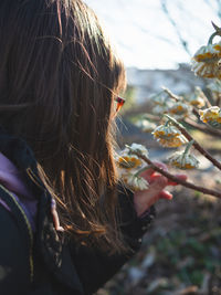 Close-up of woman looking away