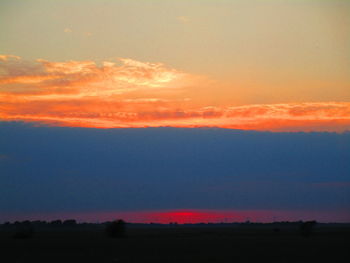 Scenic view of silhouette landscape against sky during sunset