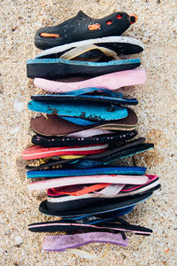 Plastic flip flops washed ashore