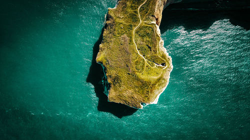 Aerial view of cliff amidst sea