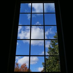 Low angle view of building against cloudy sky