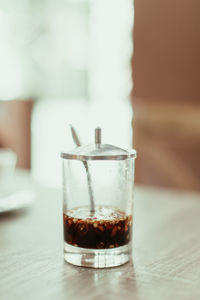 Close-up of beer in glass on table