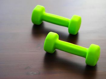 Close-up of dumbbell on floor