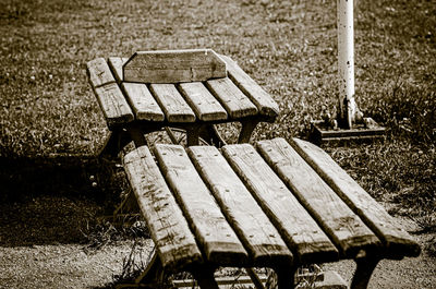 High angle view of empty bench in park