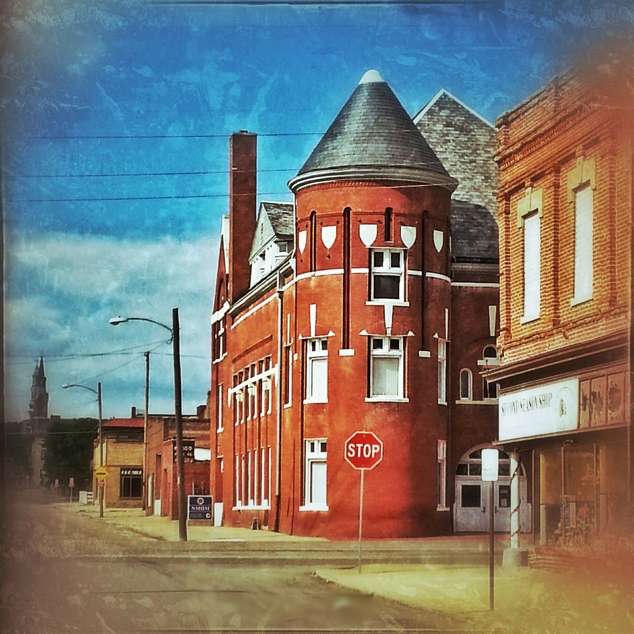 VIEW OF ROAD ALONG BUILDINGS