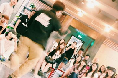 People looking at mobile phone