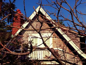 Low angle view of built structure against blue sky