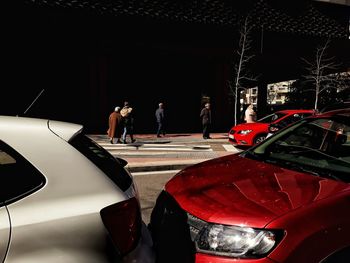 People on car moving on road