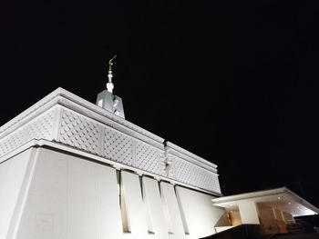 Low angle view of building against sky at night