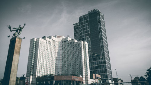 Low angle view of modern buildings against sky