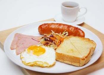 Close-up of breakfast served on table