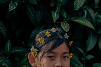 Close-up of young woman looking away