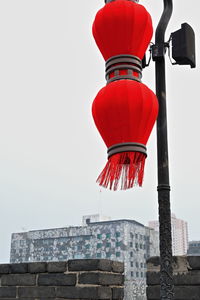 Low angle view of red building against sky