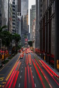 High angle view of light trails on road in city
