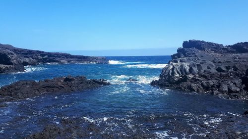 Scenic view of sea against clear sky