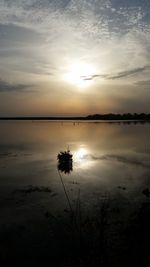 Scenic view of sunset over sea