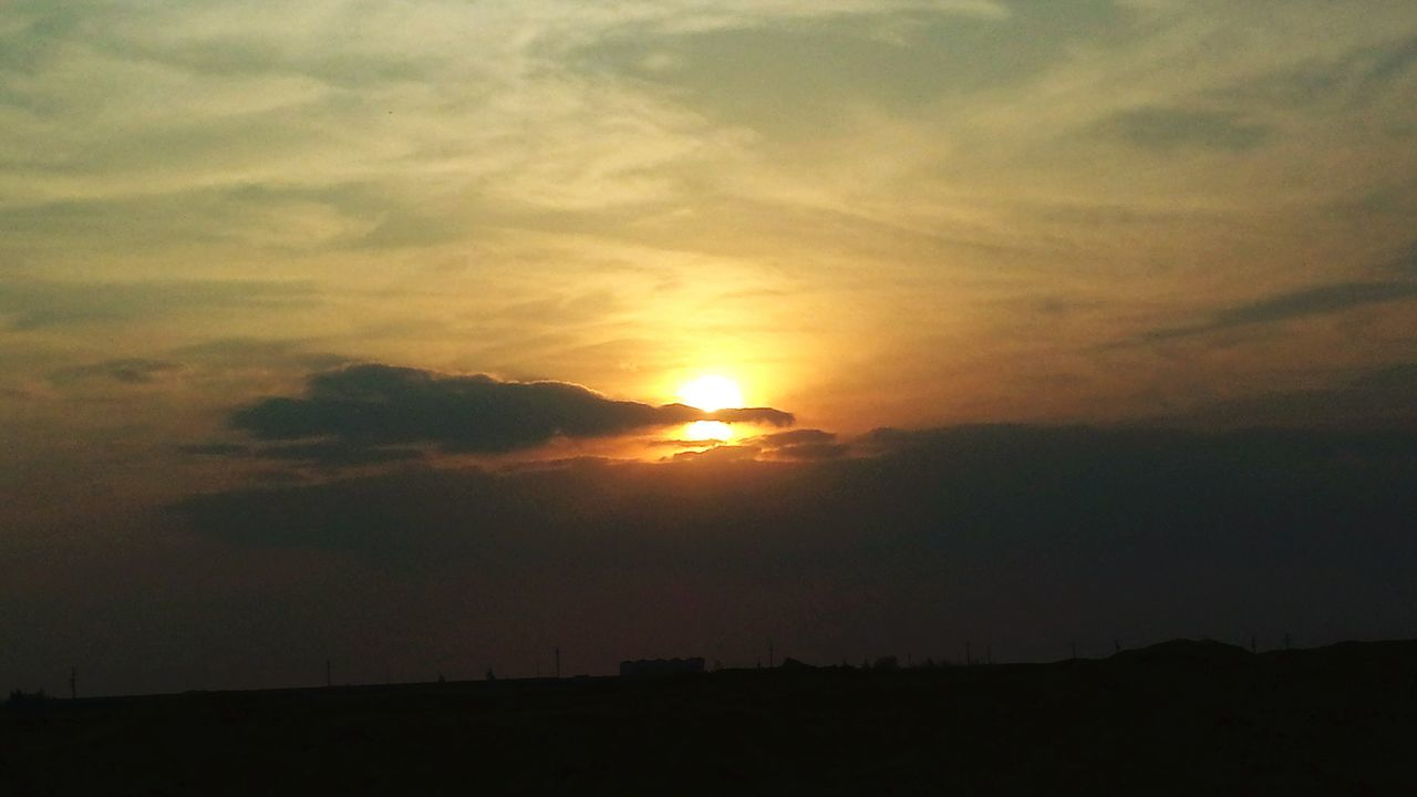 sunset, silhouette, orange color, sky, beauty in nature, sun, tranquil scene, scenics, nature, no people, tranquility, cloud - sky, outdoors, landscape, day