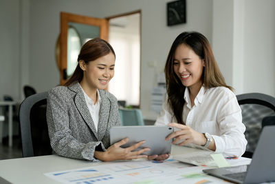 Business colleagues working at office