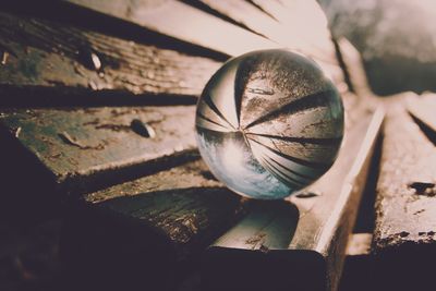 High angle view of old metal on wood