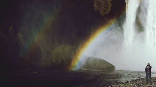 Scenic view of rainbow over sea
