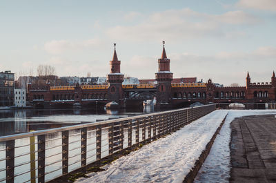 View of river in city during winter