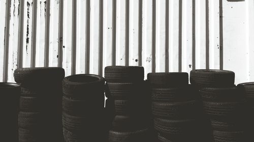 Vehicle tires stacked against wall