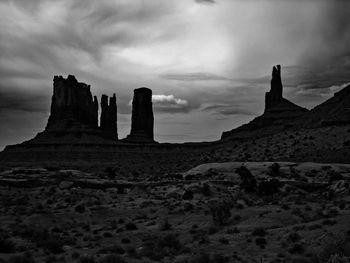 Low angle view of old ruin against cloudy sky