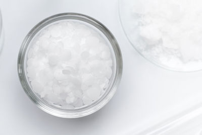 High angle view of glass jar on table
