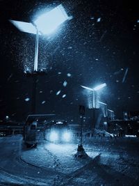 Illuminated street light at night