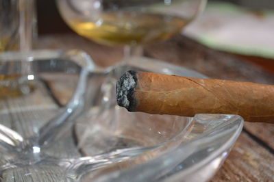 Close-up of beer glass on table