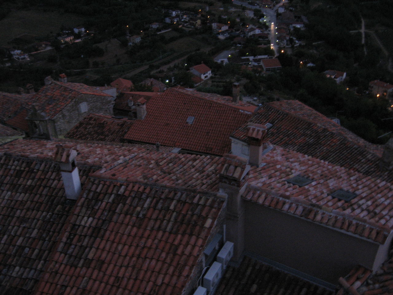 HIGH ANGLE VIEW OF TOWN AGAINST SKY