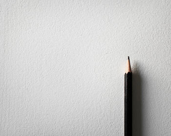 Close-up of pencils on paper