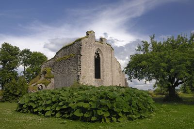 Low angle view of old building against sky