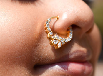 Close-up portrait of girl wearing nose ring