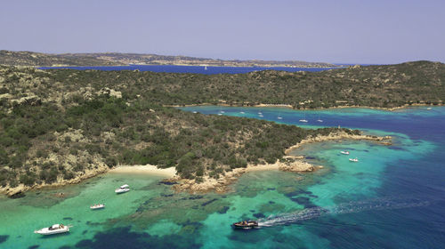 Scenic view of sea against clear blue sky