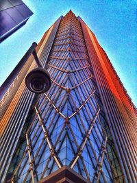 Low angle view of building against blue sky