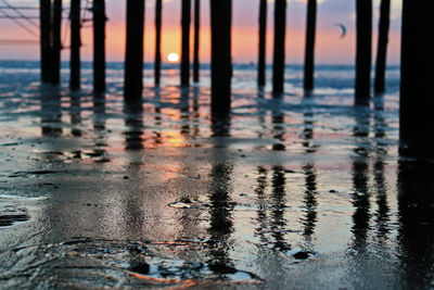 Scenic view of sea against sky at sunset