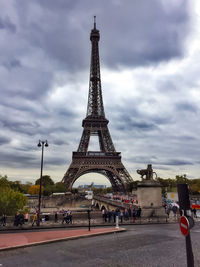 View of tower against cloudy sky