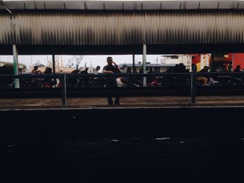 Woman at railroad station